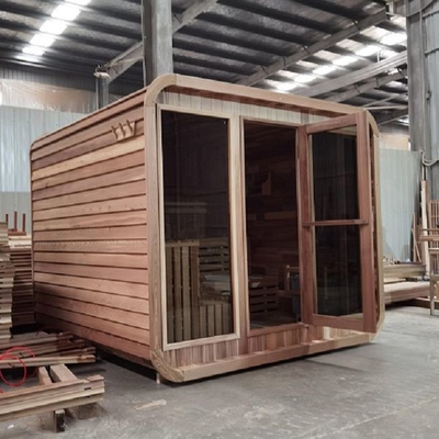 Rustikaler Cedar Steam Sauna Rounded Square im Freien mit Bitumen-Schindel-Deckung